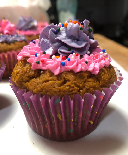 Cupcake with pink & purple frosting.